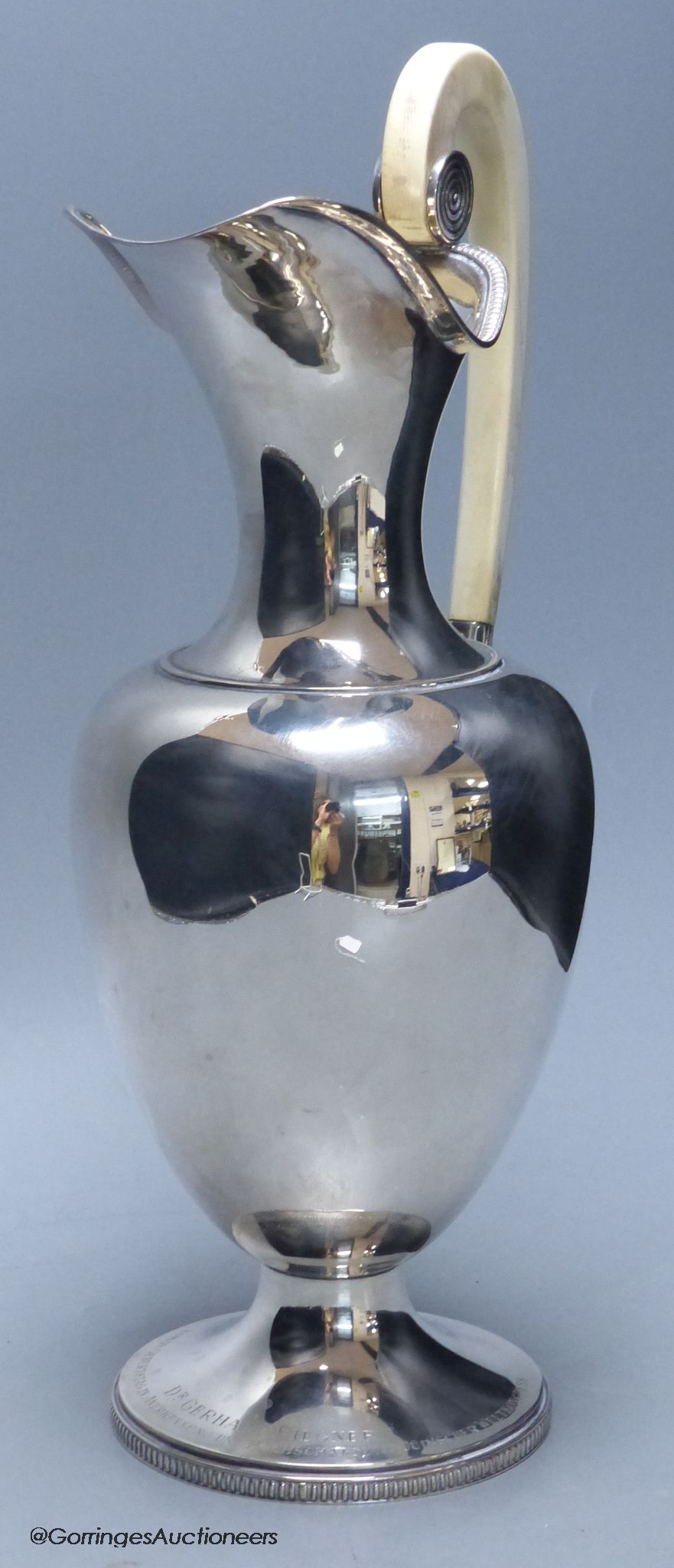 A German ivory handled 800 standard white metal vase shaped ewer, with presentation inscription, height 36cm, gross weight 24.5oz.